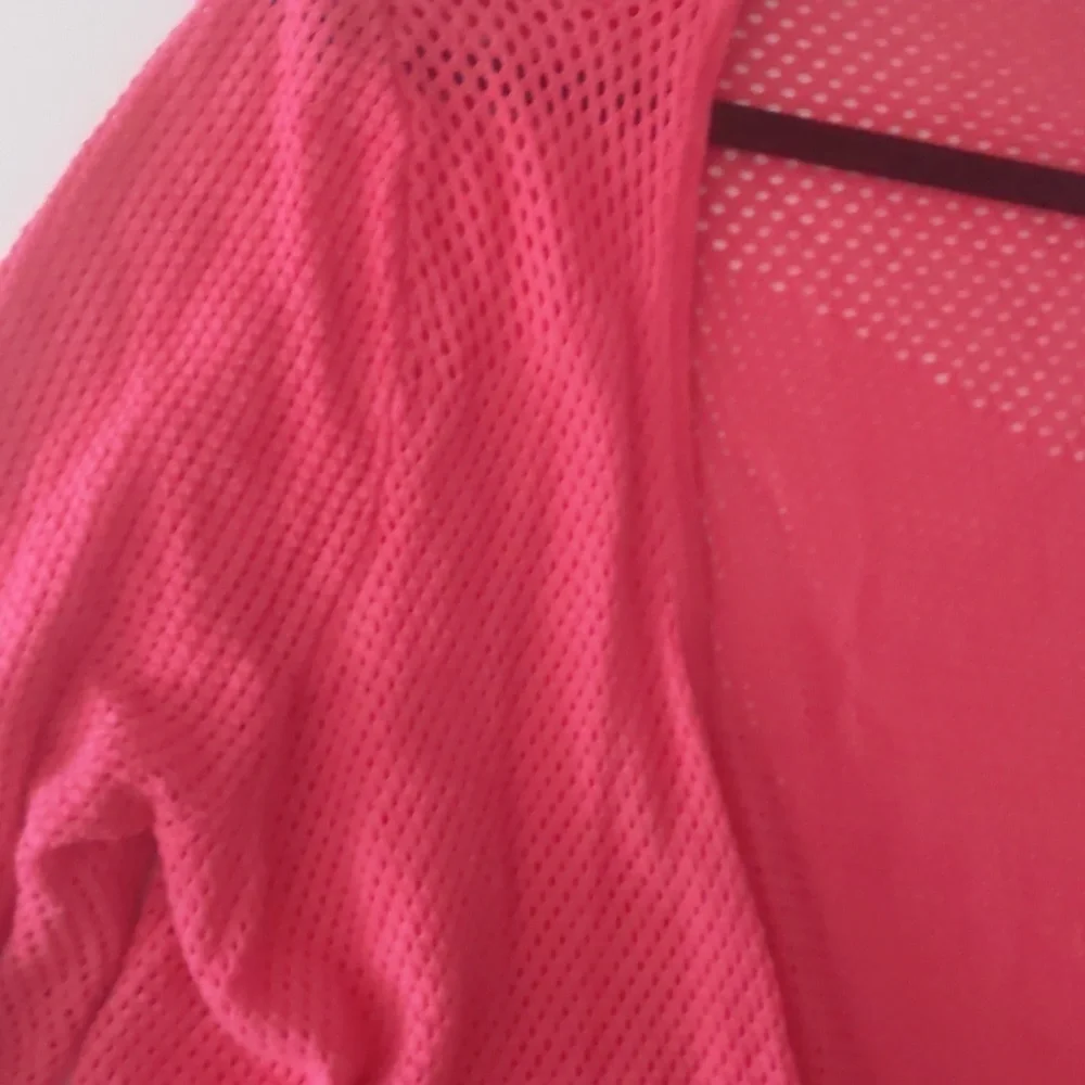 Faded glory asymmetrical hem salmon color sweater. Size large.